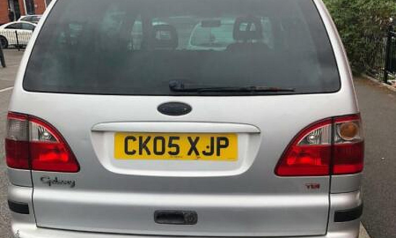 Silver Ford Galaxy 1...
